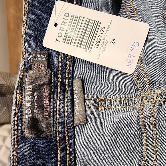 Torrid - Slim Boot Vintage Stretch Mid-Rise Jean in Mid-Wash Blue​​​​​​​ - Picture 6 of 10